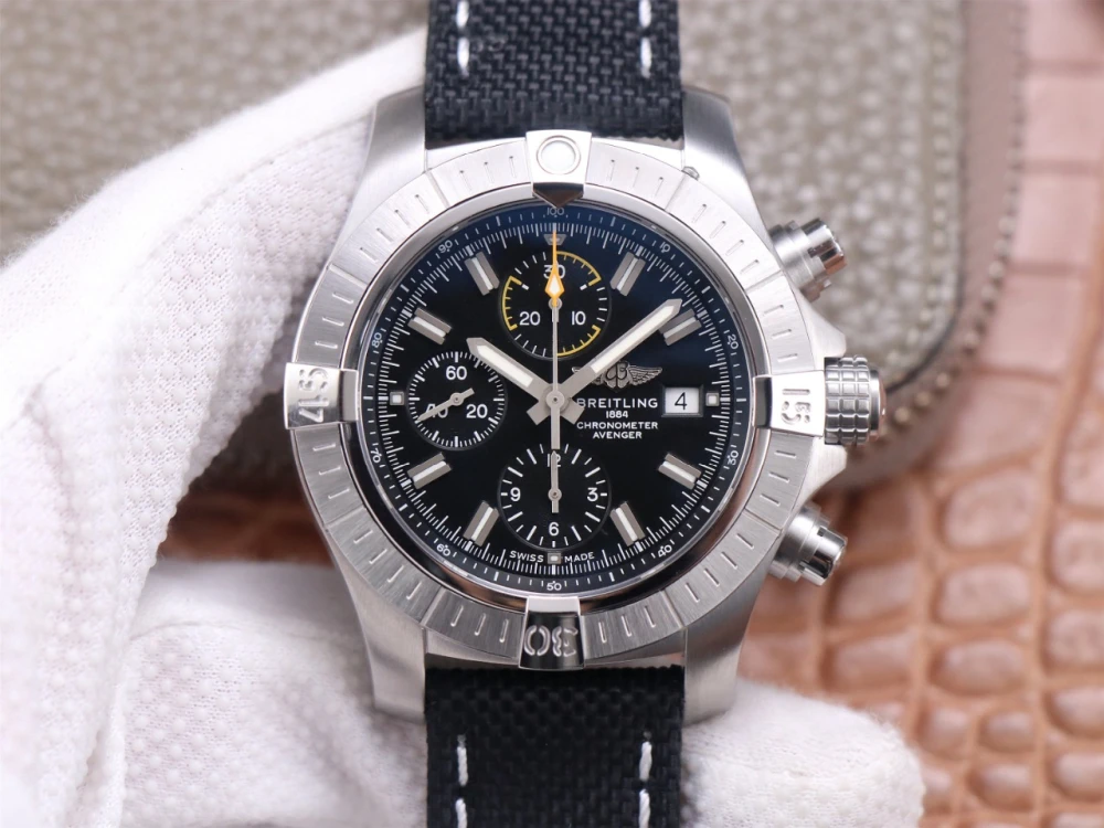 Breitling Avenger Chronograph A13317101B1X1 on black canvas strap, brushed stainless steel bezel, and black dial