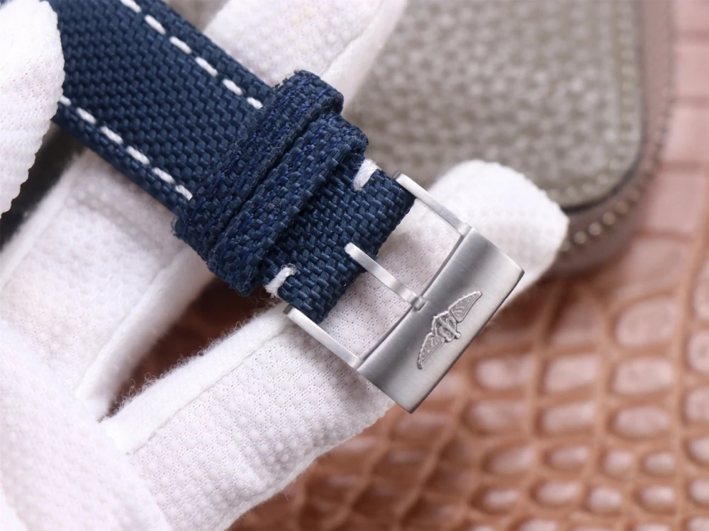 Breitling Avenger Chronograph A13317101C1X1 navy canvas strap with brushed stainless steel buckle engraved with winged logo