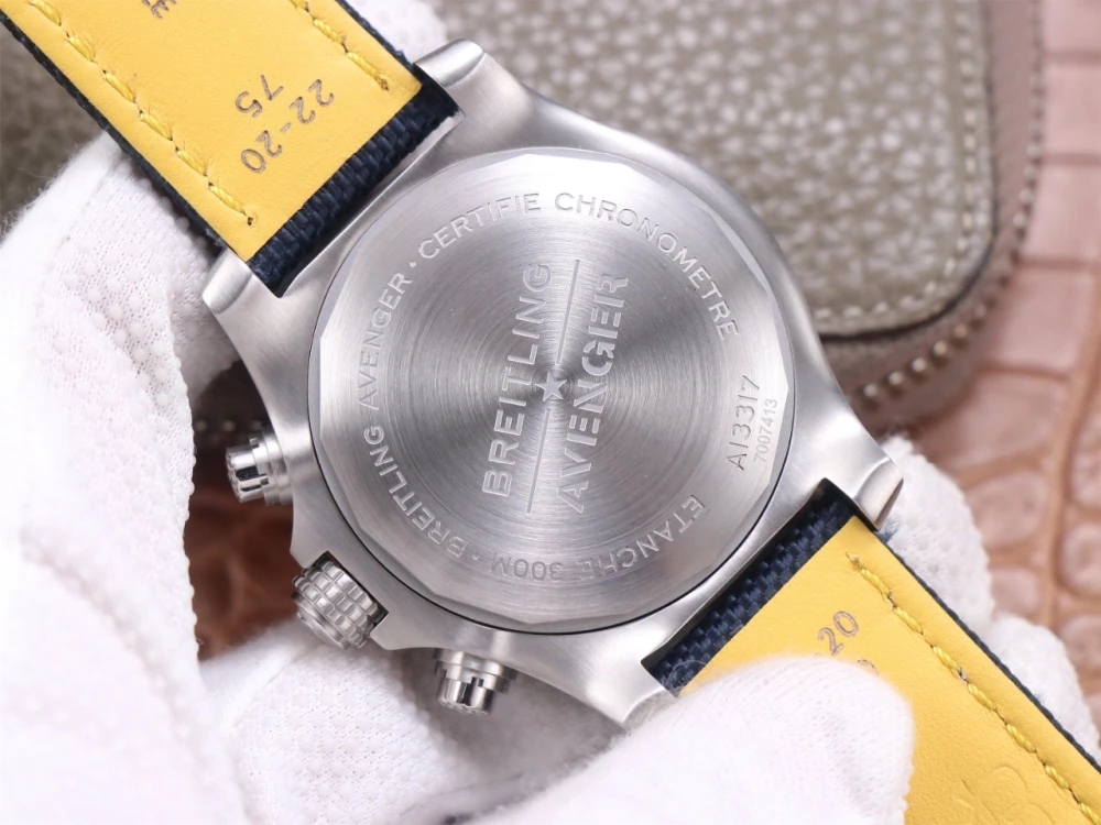 Solid stainless steel case back of Breitling Avenger Chronograph A13317101C1X1 replica engraved with 'ETANCHE 300M' and model number A13317