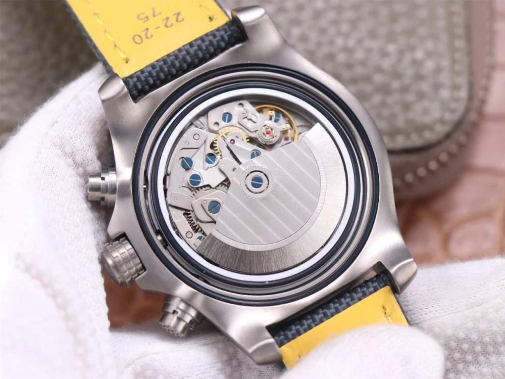 Open case back of Breitling Avenger Chronograph A13317101C1X1 replica revealing automatic movement with Côtes de Genève finishing