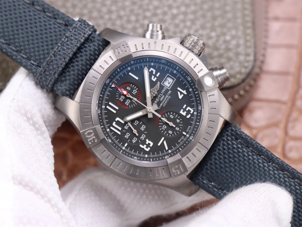 Breitling Avenger Chronograph A13375101B1X2 on black nylon strap, titanium case, and black dial with white Arabic numerals
