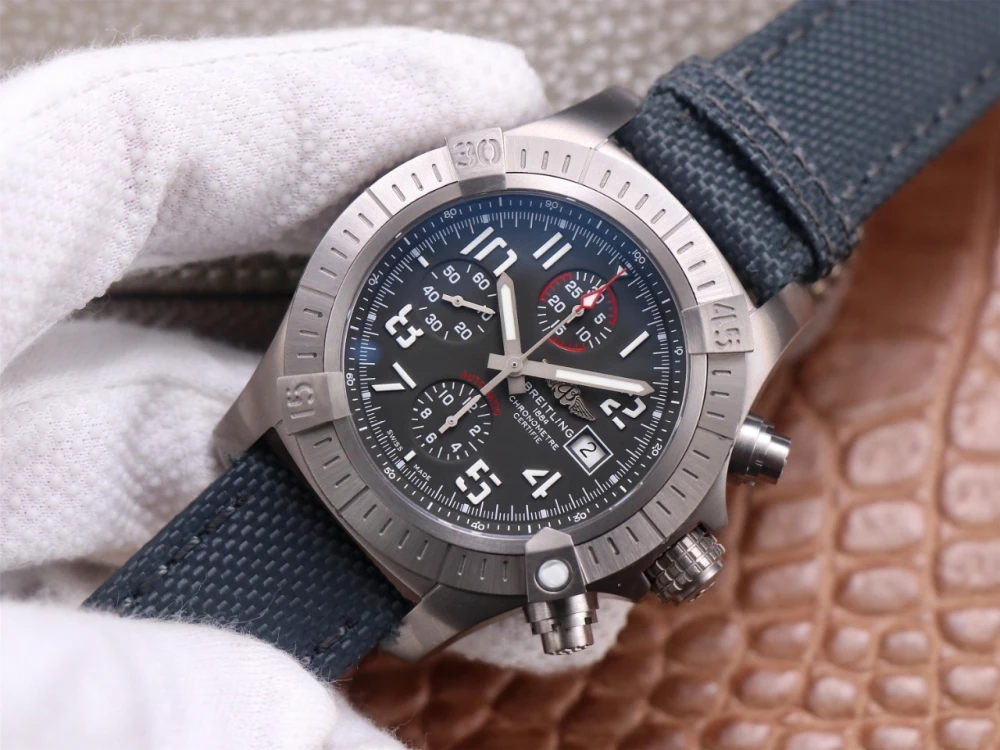 Breitling Avenger Chronograph A13375101B1X2 black dial with white Arabic numerals, red-accented 30-minute counter, and date window at 3 o'clock
