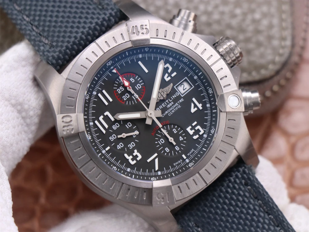 Close-up of Breitling Avenger Chronograph A13375101B1X2 black dial with red-tipped chronograph seconds hand on 30-minute counter