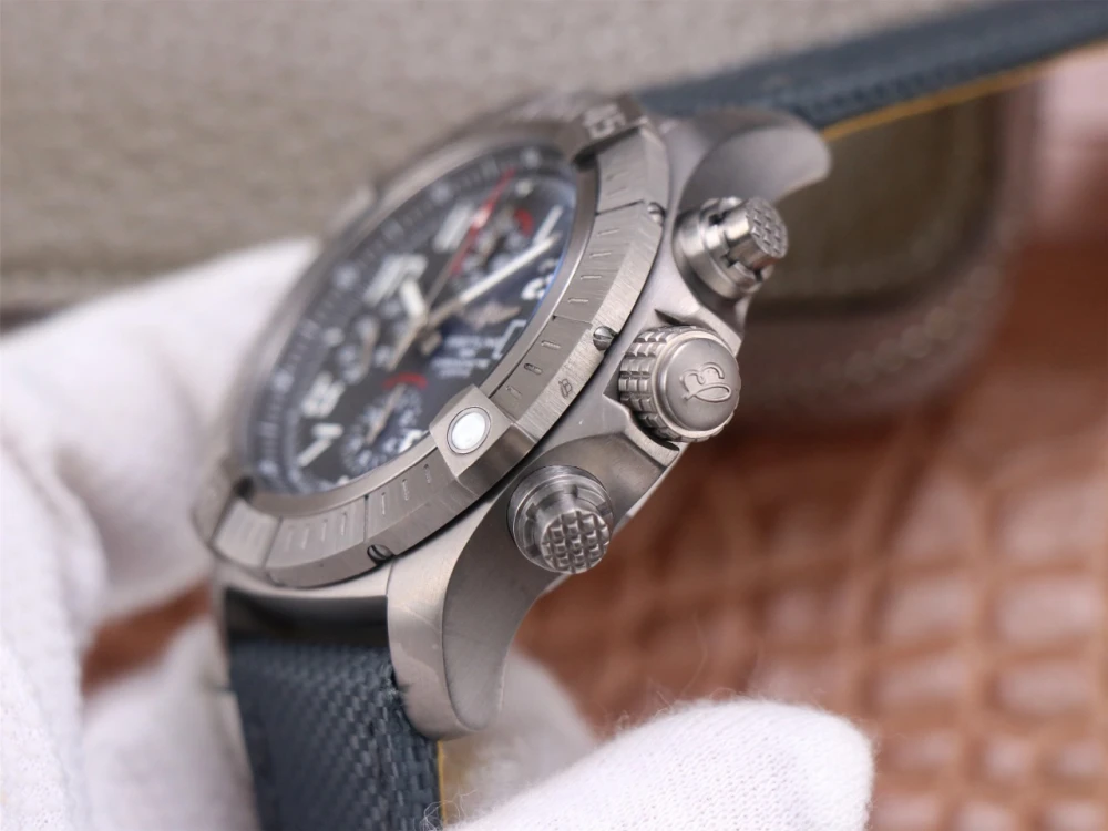 Breitling Avenger Chronograph A13375101B1X2 titanium case side with textured chronograph pushers and crown with B logo