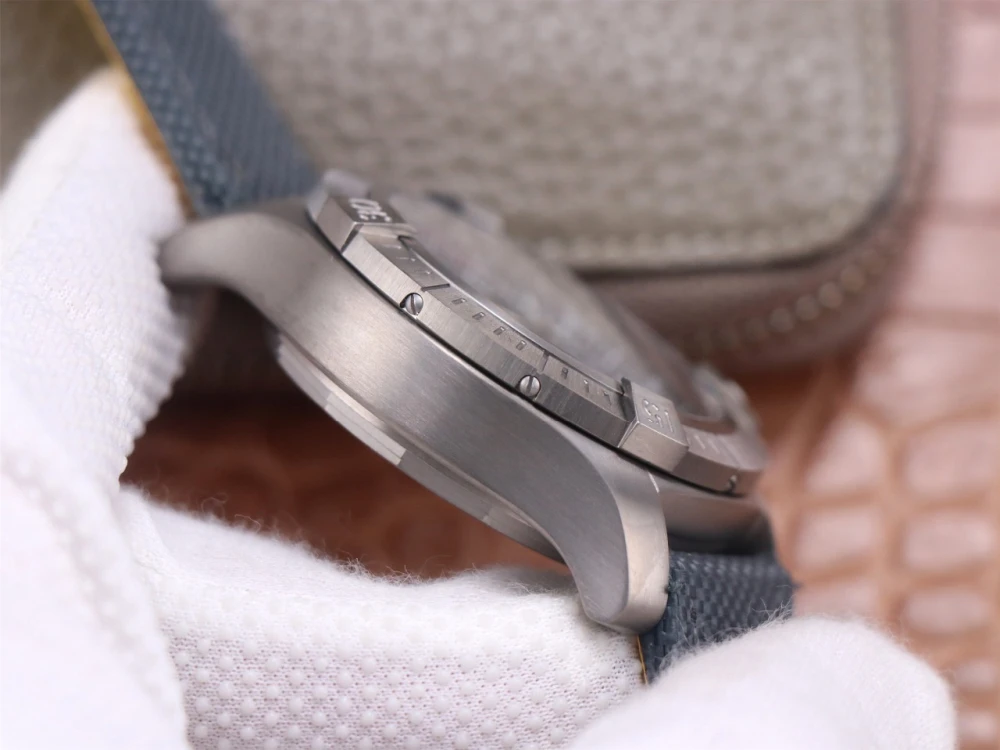 Side profile of Breitling Avenger Chronograph A13375101B1X2 brushed titanium case and unidirectional rotating bezel