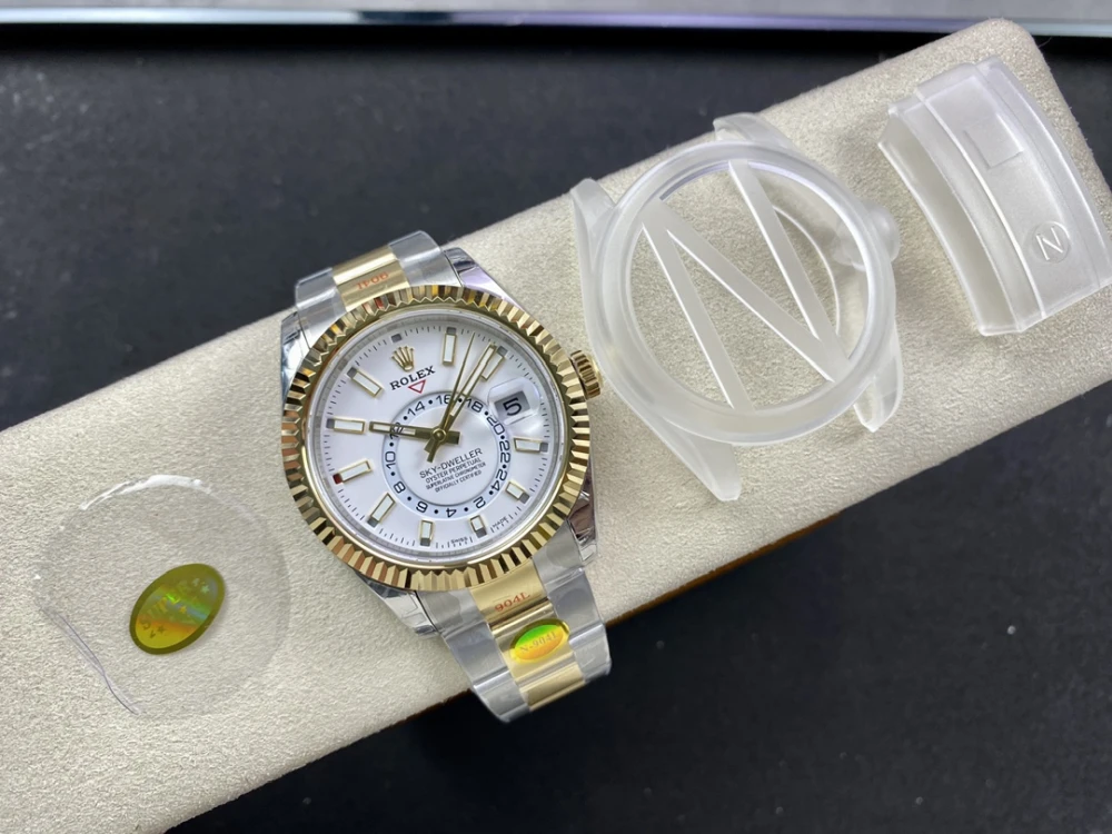 Rolex Sky Dweller watch displayed with protective plastic covers and accessories