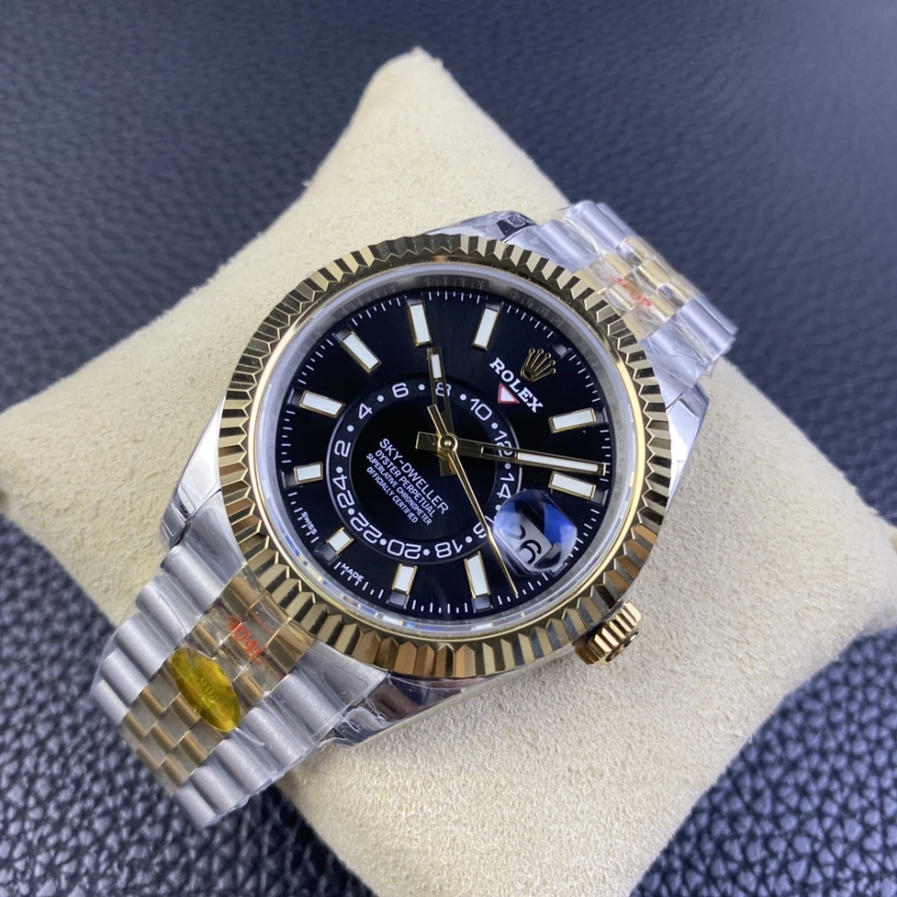 Rolex Sky Dweller two tone 18K yellow gold and stainless steel watch with black dial 42mm case fluted bezel and Jubilee bracelet right view