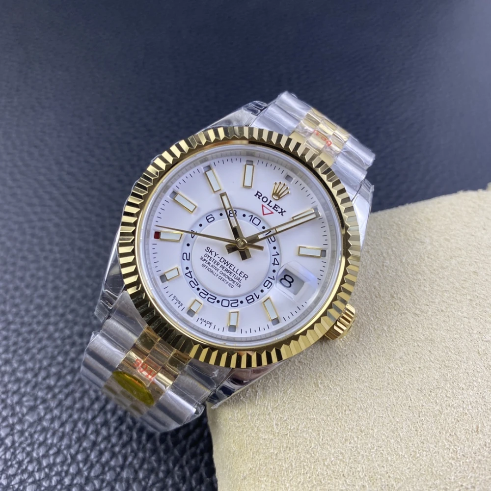 Rolex Sky Dweller two tone 18K yellow gold and stainless steel watch with white dial 42mm case fluted bezel and Jubilee Bracelet right view