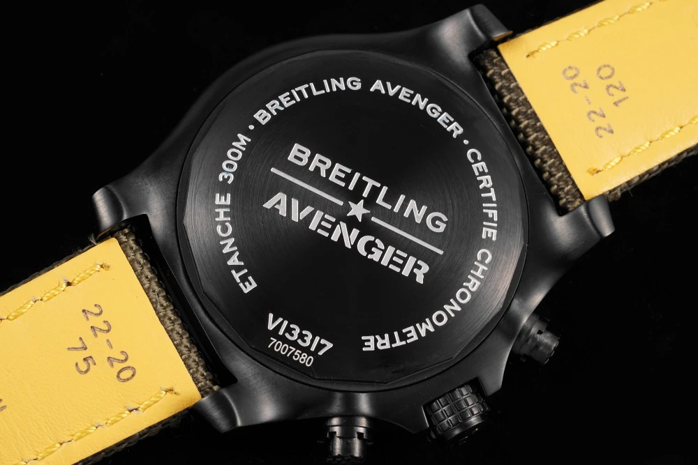 Solid black DLC-coated case back of Breitling Avenger Chronograph, engraved with 'ETANCHE 300M' and model number V13317