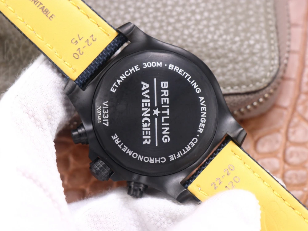 Solid black DLC case back of Breitling Avenger Chronograph replica engraved with "ETANCHE 300M" and model number V13317