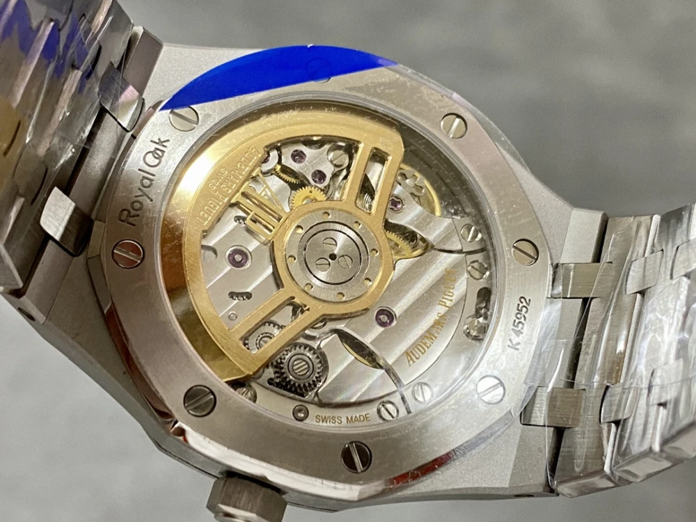 Alt Text: APS 15510ST sapphire case back, Cal.4302 integrated movement, rotor and bridge detail