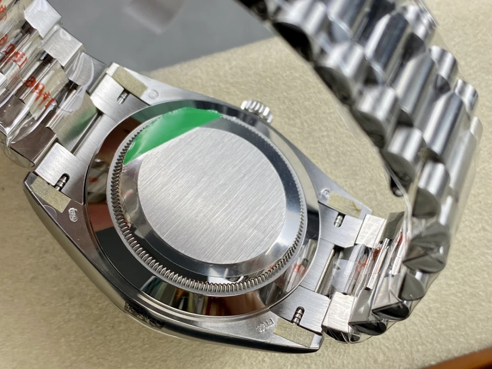 Day-Date 40mm 228236 Watch ARF 1:1 Best Edition with Grey Dial, Fluted Bezel, and President Bracelet On Asia 3255 7 Rolex Day-Date solid case back close-up, brushed finish, fluted case edge,presidential bracelet links