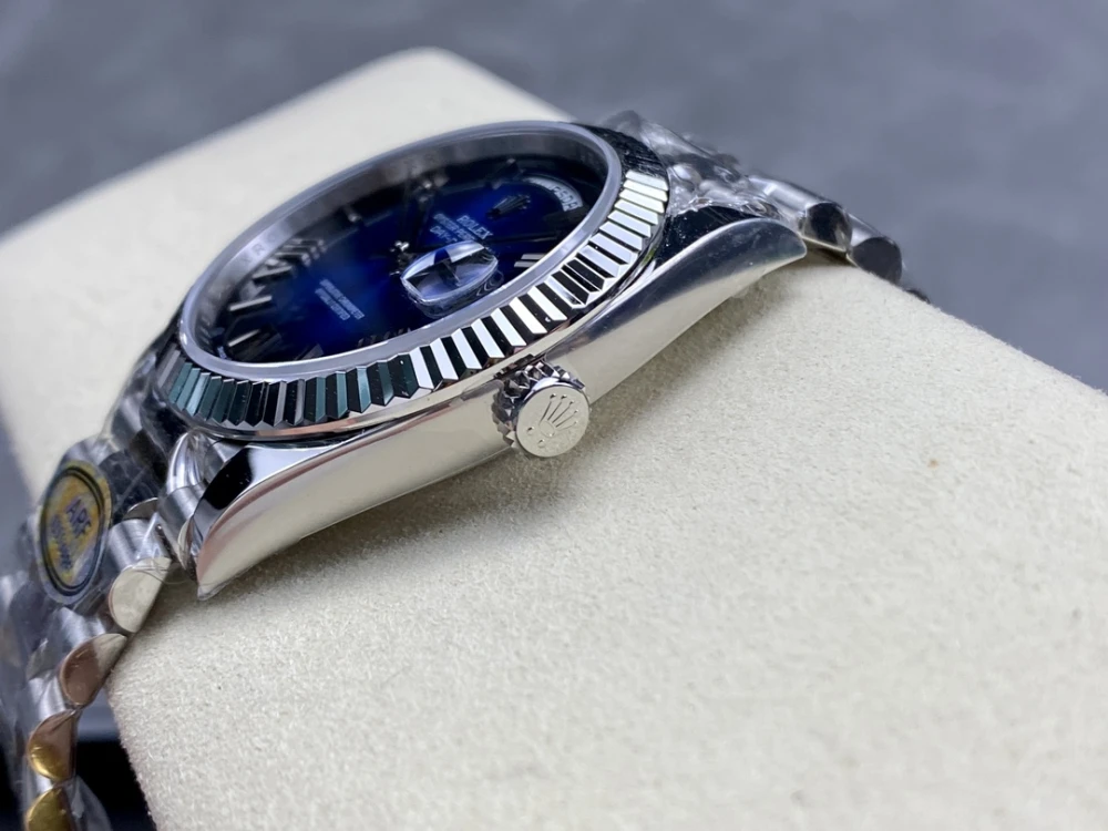 Day-Date 40mm 228236 ARF 1:1 Edition Gradient Blue Roman Dial Fluted Bezel on President Bracelet Asia3255 5 Close-up of Rolex Day-Date 40 Crown and White Gold Case Side with Polished Finish